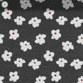 Weiße Blüten auf Anthrazit